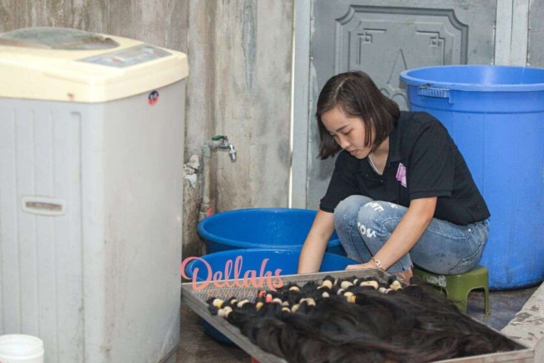 washing Dellahs Raw Cambodian Hair collected from donors in cambodia
